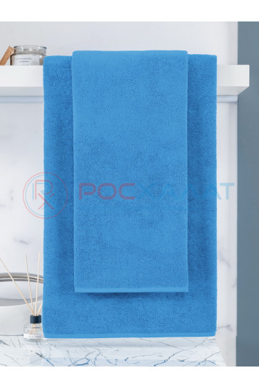 Махровое полотенце без бордюра голубое
